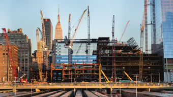 Construction-cranes-tall-buildings-NYC-iStock-498867062-1400x788
